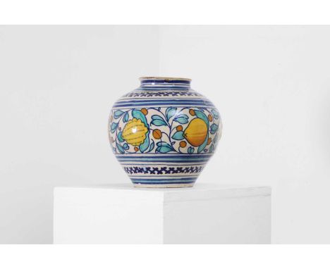 A Venetian style maiolica jar,  probably 19th century, Italian, decorated in polychrome with citrus fruits and scrolling foli