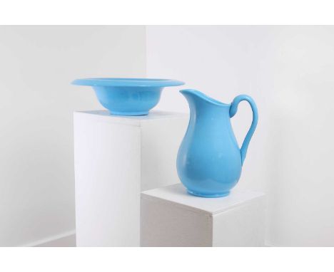 A blue opaline glass wash basin and jug,  mid-19th century, French, the jug with an applied handle, basin 37cm diameter jug 2