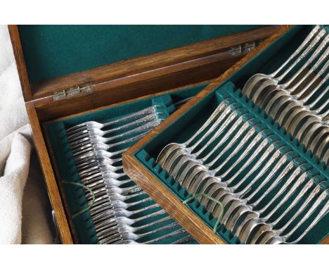 An Edwardian eighteen-setting silver canteen of cutlery, by Mappin &amp; Webb Ltd., Sheffield 1912, each decorated with a rib