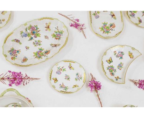 A Herend 'Queen Victoria' porcelain part dinner service, 20th century, Hungarian, each with painted and gilt-heightened decor