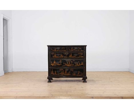 A black and gilt japanned chest of drawers,  early 18th century and later, decorated with chinoiserie motifs, fitted with two