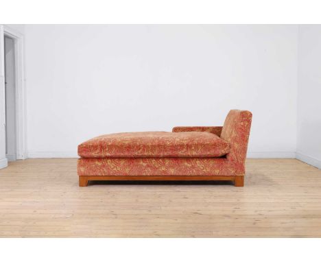 An upholstered daybed, of recent manufacture, covered in paisley fabric,90cm wide174cm long77cm highProvenance: A private col