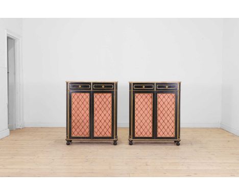 A pair of Regency-style ebonised and parcel-gilt side cabinets, 19th century, each faux marble top over two frieze drawers, a