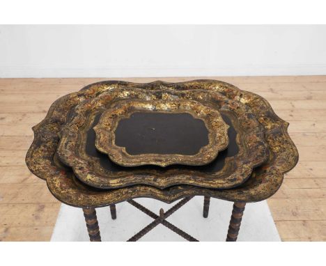 A set of three Victorian graduated papier mâché trays, by Jennens &amp; Bettridge, London, each of shaped rectangular outline
