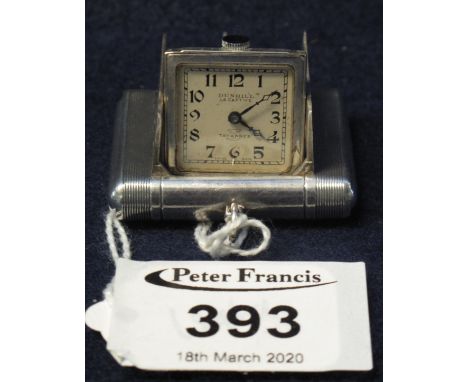 Silver cased Dunhill 'La Captive' engine turned rectangular shaped purse or fob watch with two door opening action, Arabic fa