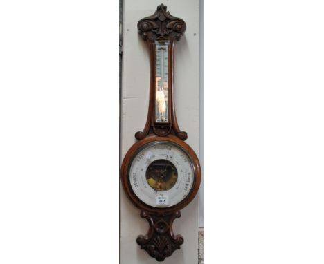 Early 20th Century oak carved wall aneroid barometer marked J.H Steward, Strand. (B.P. 24% incl. VAT) CONDITION REPORT: Not t