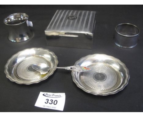 Group of assorted silver and other items to include: two napkin rings, engine turned cigarette box, novelty spoon and two pin