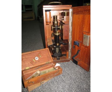Box of cased scientific equipment to include; a cased Carl  Zeiss Jena enamelled and polished brass microscope, various boxes
