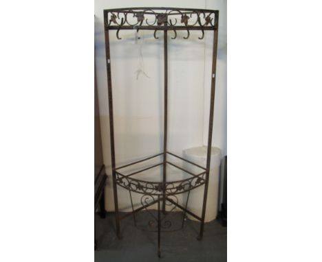 Wrought iron corner coat, hat, umbrella and stick stand with ivy decoration. (B.P. 24% incl. VAT)