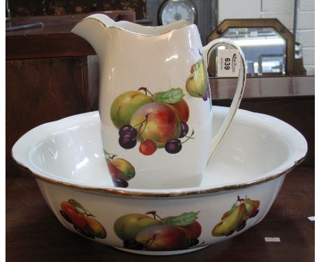 Rubian art pottery fruit design jug and basin set. (B.P. 24% incl. VAT)