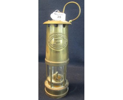 E Thomas &amp; Williams Ltd of Aberdare brass miner's safety lamp, unused. (B.P. 24% incl. VAT)