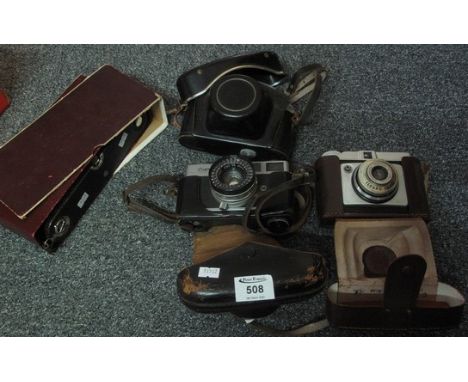 Box of vintage cameras to include; three in leather cases including; Ilford Sporti, Canon Canonet, Praktica and a cardboard c