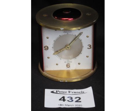 Small Jaeger 8 day cylindrical shaped travelling alarm clock.(B.P. 24% incl. VAT)