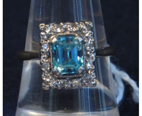 Rectangular cut 18ct gold blue stone and diamond ring.(B.P. 24% incl. VAT) CONDITION REPORT: 342 stone - 0.6 x 0.7 (depth not