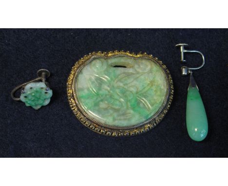 Jade carved brooch and a pair of earrings.(B.P. 24% incl. VAT)