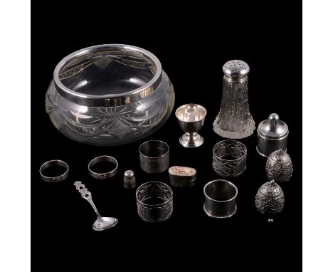 A silver candle box, Josiah Williams &amp; Co, London 1908; pair of silver Art Nouveau style napkin rings; pair of scroll des