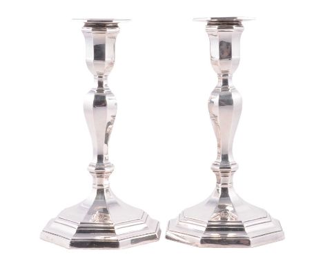 AMENDMENT - MATCHED Pair of silver candlesticks, Daniel &amp; John Welby, London 1912, and TAS Sheffield 1905, octagonal form