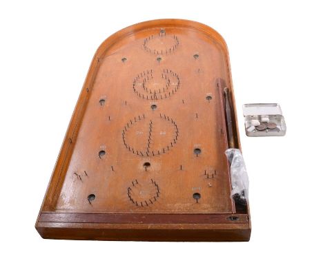 An F H Ayres early bagatelle board with twenty ball beaings, manual pusher, board 76x39cm; a shove ha'penny board, 54x38cm, w