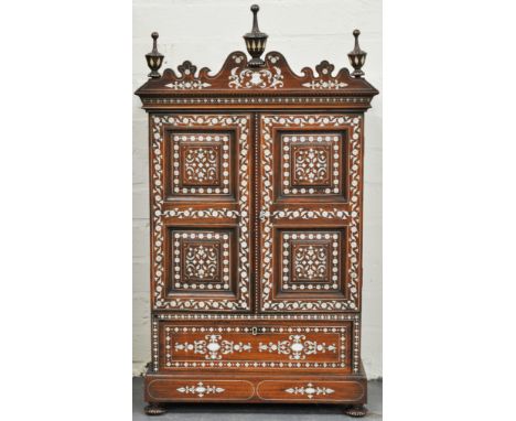 Indian Hoshiapur inlaid table cabinet, with urn finials, two panel doors enclosing a single shelf, drawer under, height 79cm.