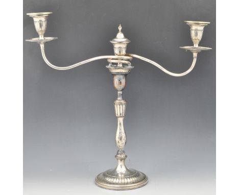 Pair of plated three light candelabra, in the style of Robert Adam, slender pear shape columns, circular bases, 46cm.