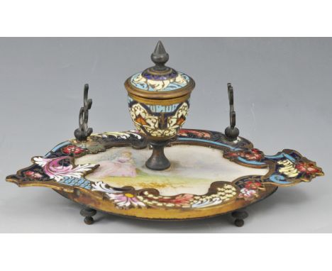 French gilt metal champlevé enamel and porcelain inset encrier, Rococo shaped, panel painted with a young lady reading by a r