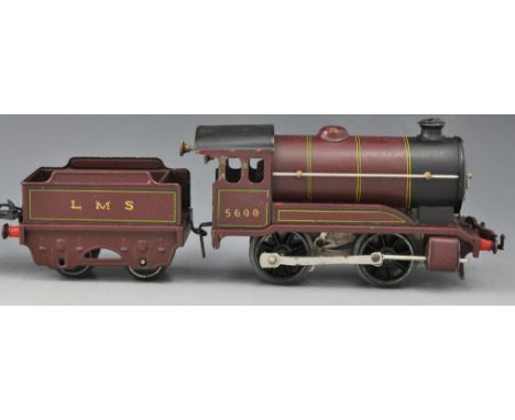 Hornby clockwork train set, including tank engine and tender, other rolling stock and accessories, some boxed and track.