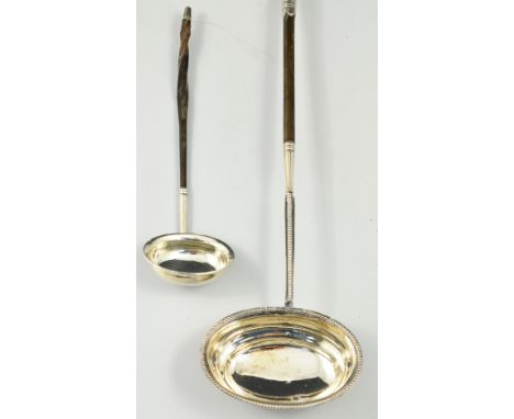 George III silver punch ladle, London possible 1785, twisted whale bone handle, 40cm and another ladle of small size, with a 