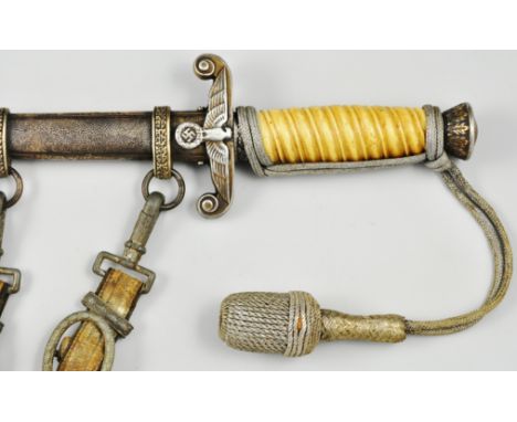 German army Officers dress dagger, 25cm double edged blade by Alcoso, ivorine grip in a scabbard with sword knot and hanging 