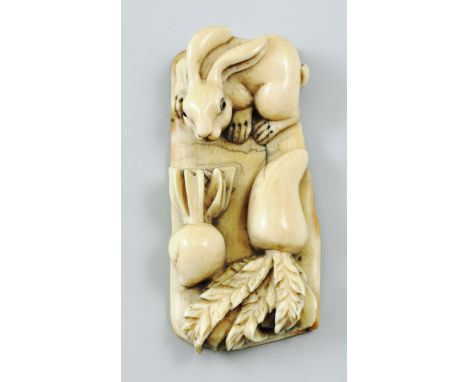 Japanese carved ivory Netsuke Meiji or earlier, designed as a rabbit with Vegetables, 6cm.