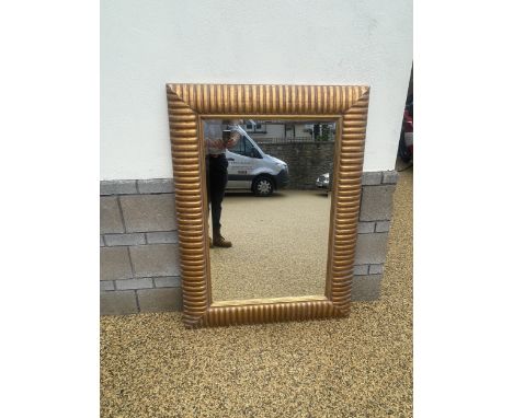A modern gilt framed wall mirror, 122 x 90 cm