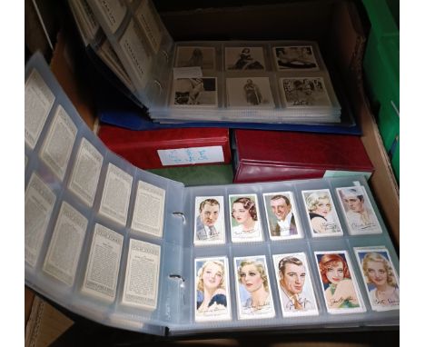 Assorted cigarette cards, in five albums