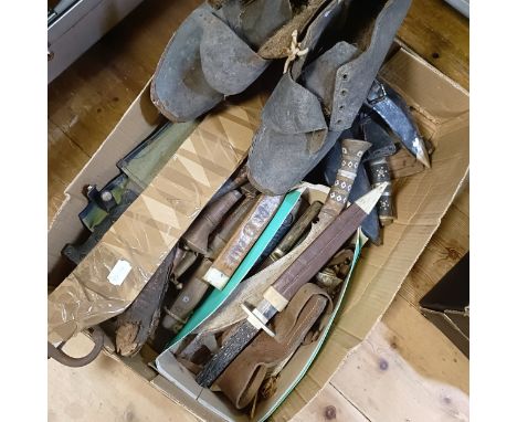 A bayonet, a kukri, assorted other knives, a pair of work boots and a spear (qty)