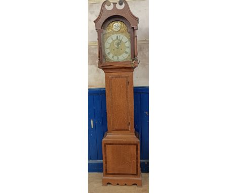 A longcase clock, with a brass dial, with a subsidiary second dial, and date aperture, signed F Shippard, Poole in an oak cas
