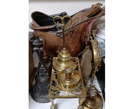 A 19th century brass door stop, 25 cm high, a 19th century brass trivet decorated a cat, 25 cm wide, a hand bell, a table gon