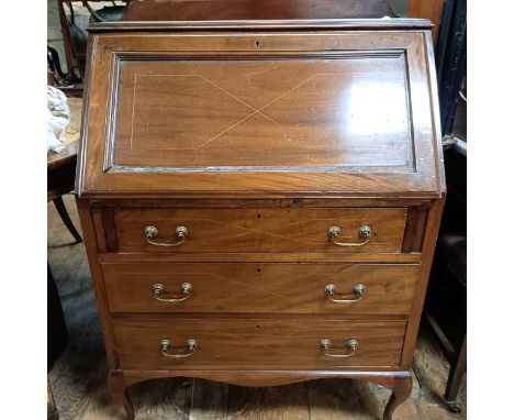 A mahogany bureau, 78 cm wide, a marble topped washstand, a pot cupboard, a button back chair, a coal purdonium, and a drople