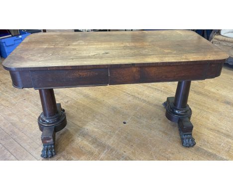 A rosewood library table,  130 cm wideno faux drawers, large variation of colour to top, various losses, in untouched conditi