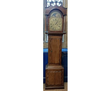 A longcase clock, with brass dial, with a painted moon face, second dial and date aperture, by John Bishop, Bridport, in an o