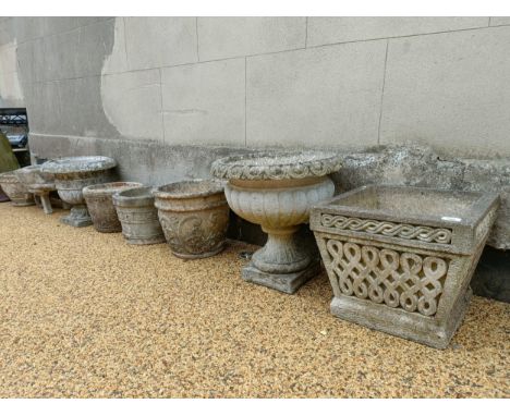 A composite stone planter and seven others (8)