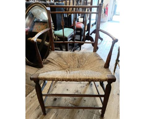 A country made armchair with a reeded seat, and three Victorian balloon back parlour chairs (4)