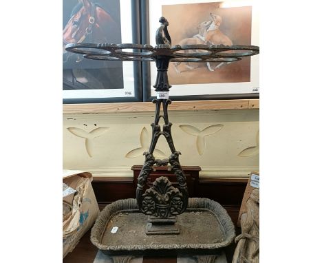 A cast iron stick stand, 60 cm high
