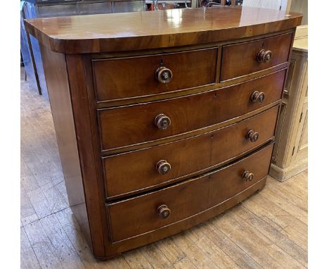 A mahogany bow fronted chest, having two short and three long drawers, 120 cm wide