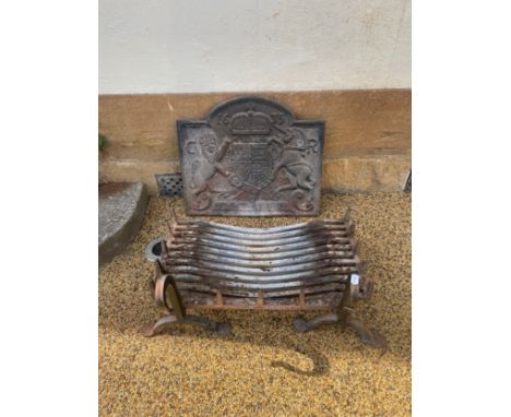 A cast iron fire back, 70 cm wide, and a Jim Lawrence&nbsp;wrought iron fire basket with dogs (4)