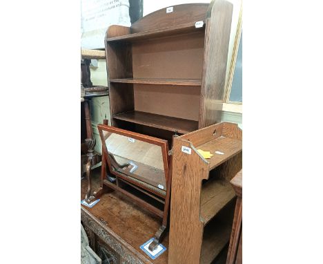 An oak bookcase, 62 cm wide, an oak shelf, a mirror, a side table, a grey armchair,&nbsp; and a stool (6)