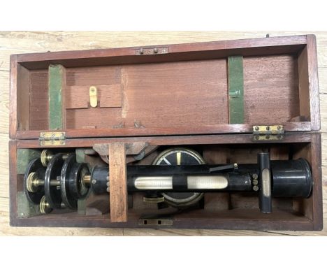 A surveyor's level, two barometers, a tripod, a novelty carpet game and assorted other items (box)