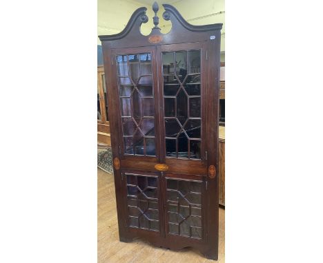 A 19th century mahogany floor standing corner cabinet, 93 cm wide