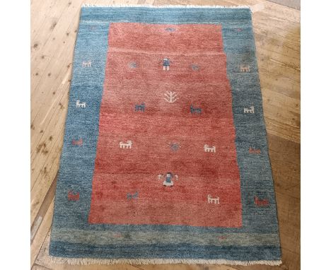 A tribal red ground carpet, 193 x 144 cm