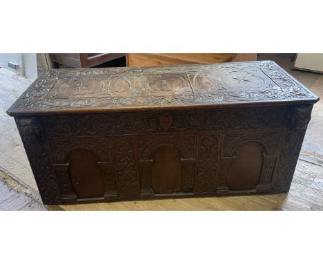 A carved oak coffer, 130 cm wide