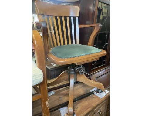 A walnut office chair, an oak gateleg table, and an armchair (3)