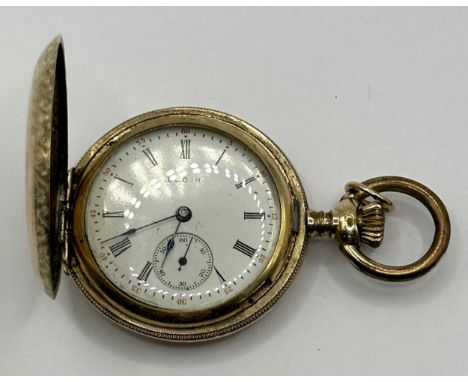 A ladies gold plated fob watch, and an early 20th century 9ct gold, amethyst and seed pearl pendant, 50 x 25 mm approx.