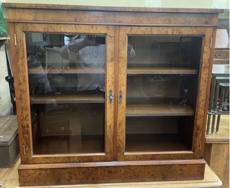 A modern walnut pier cabinet, 100 cm wide